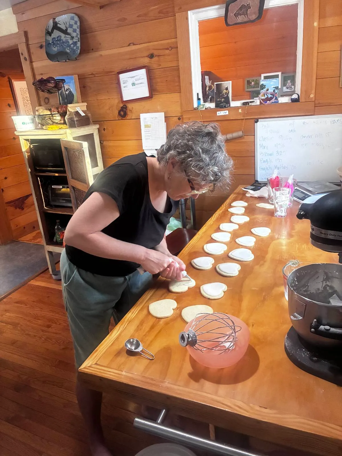Hand-decorating cookies in the bakery