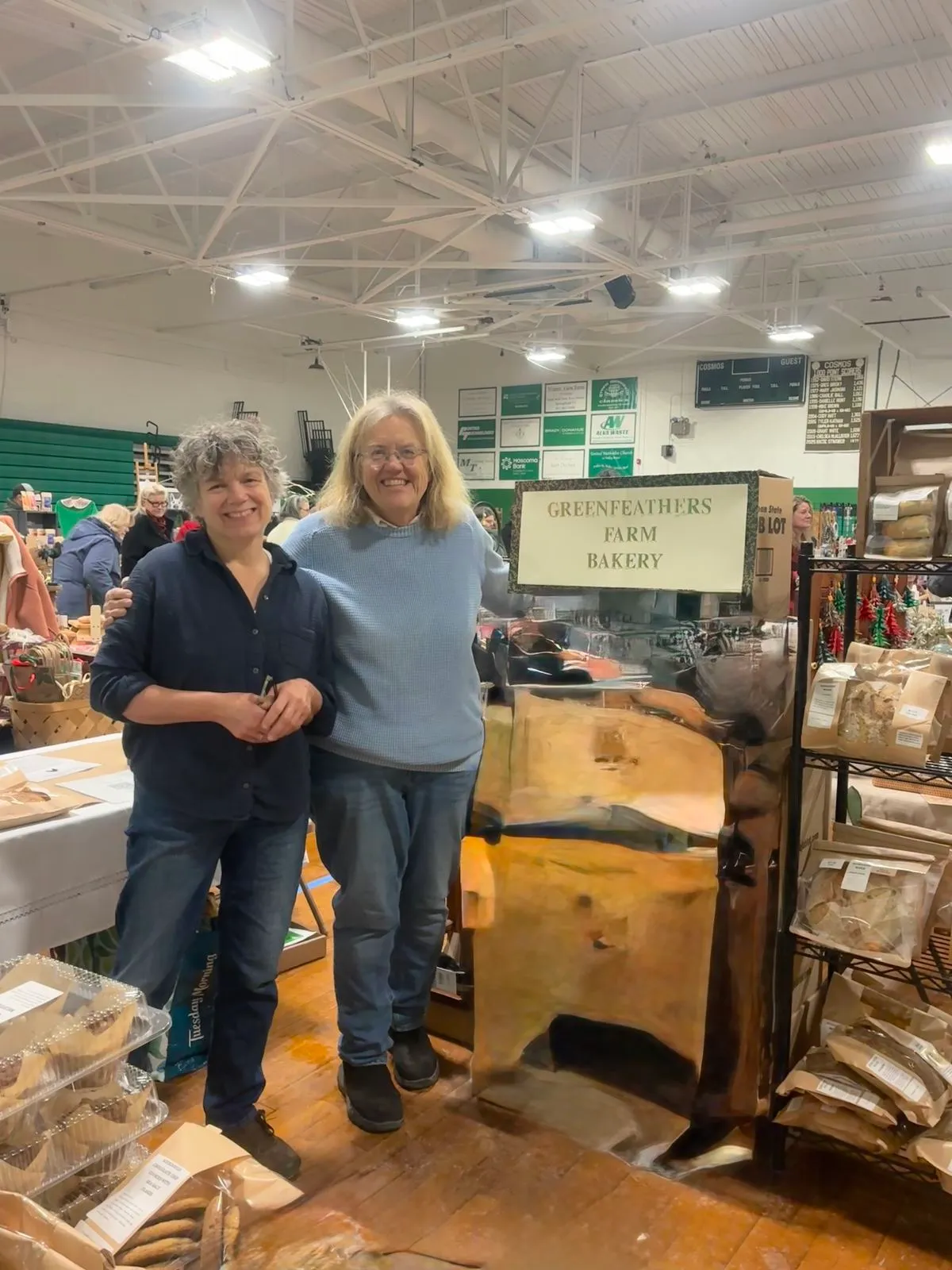 The two bakers behind Greenfeathers Farm Bakery at their market stall